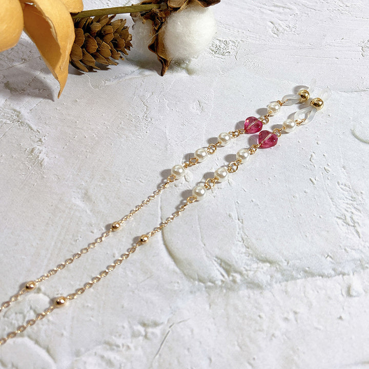 Delicate jewelry chain with pearls and crystals Bowlift