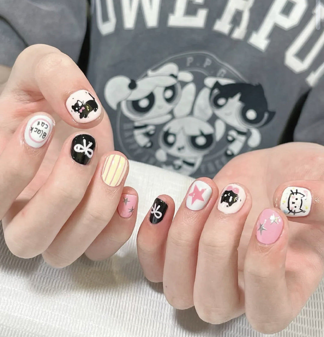 Artistic Press-On Nail Set with Floral and Glossy Accents Bowlift