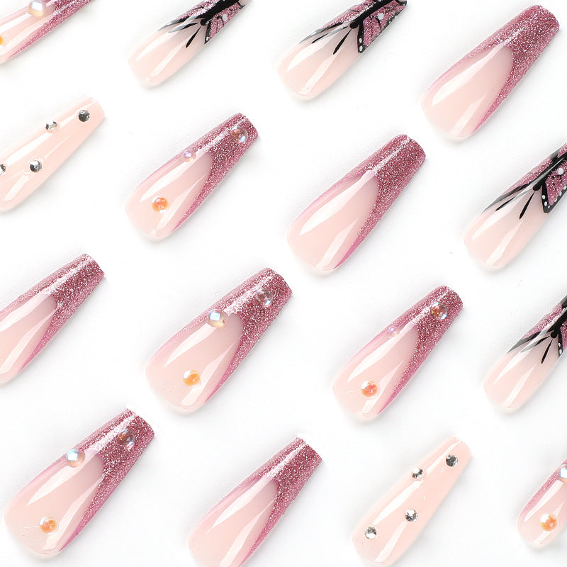 Artful stiletto nails with floral and glittering accents Bowlift