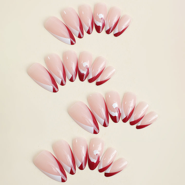 Acrylic nail set with stylish French tip design and elegant color gradients Bowlift