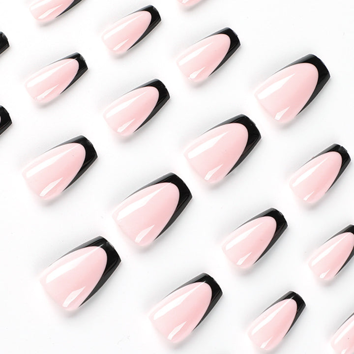 Elegant stiletto nails with contrasting French tip Bowlift