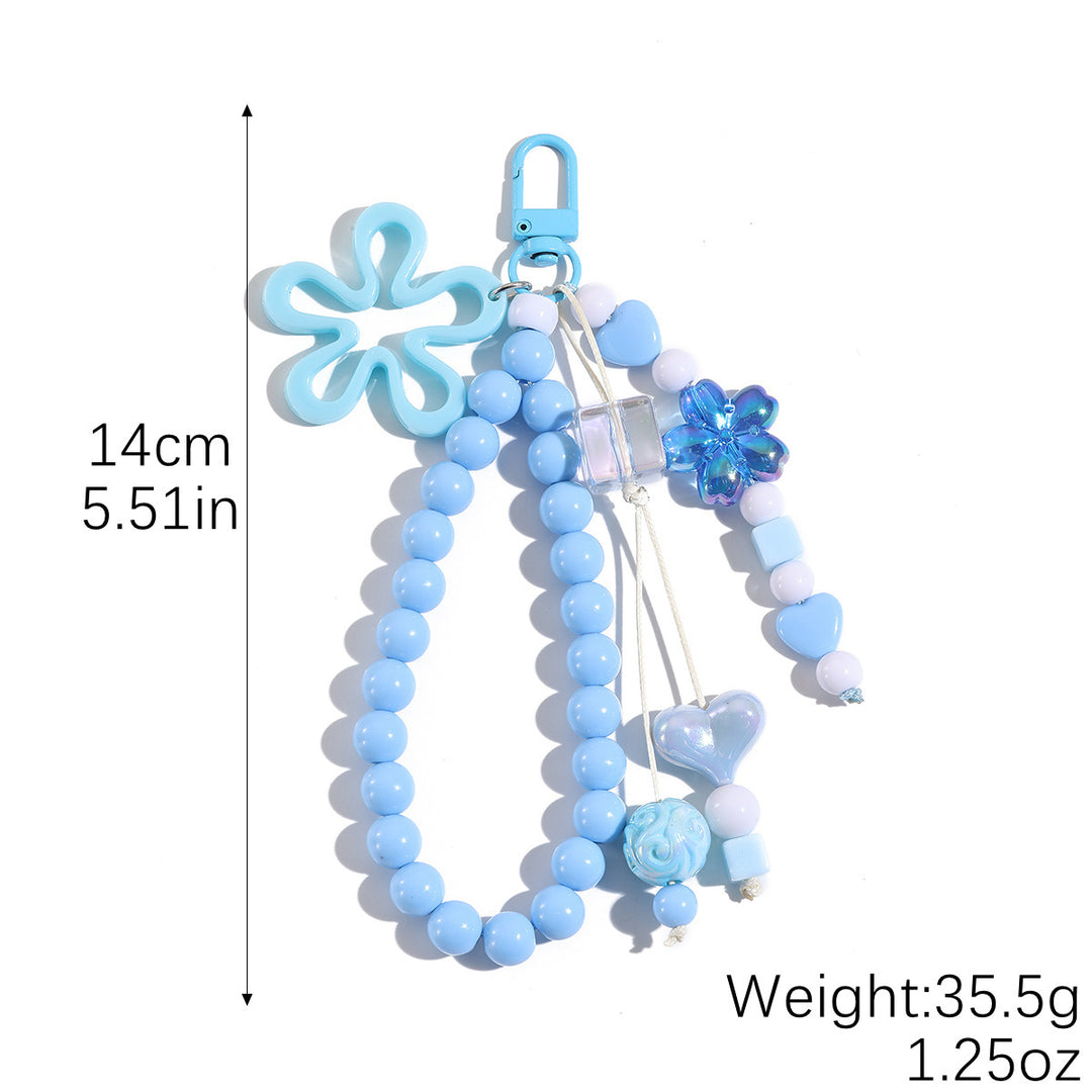 Playful keychain with flower and butterfly details Bowlift