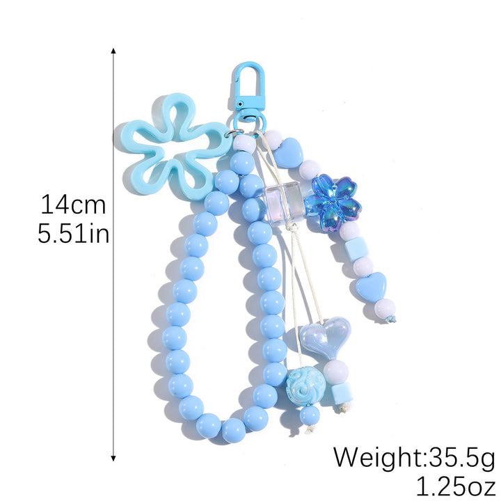 Playful keychain with flower and butterfly details Bowlift