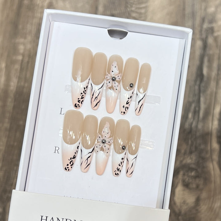 Artistic Stiletto Nail Art Set with Elegant Decorative Elements Bowlift