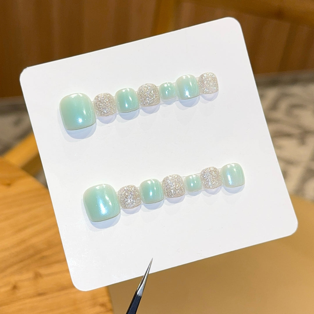 Acrylic nail set with glitter and pastel accent Bowlift