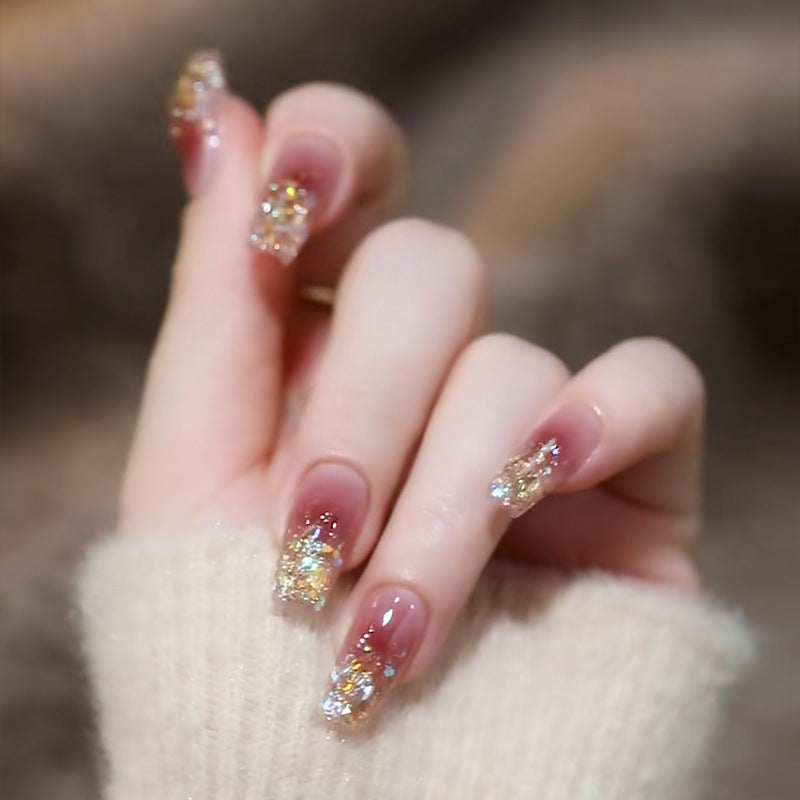 Artistic Press-On Nail Set with Glittery Star Accents Bowlift