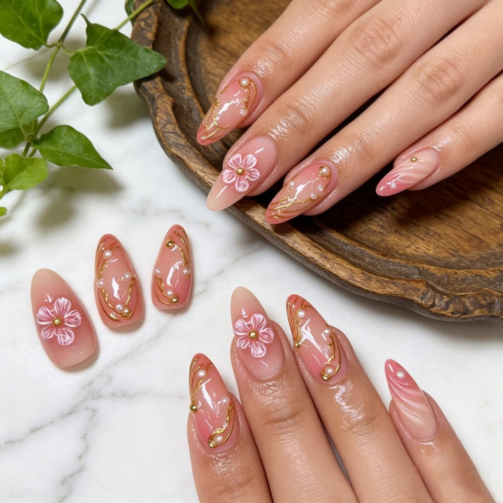 Artificial nails with floral decorations and gold accents Bowlift