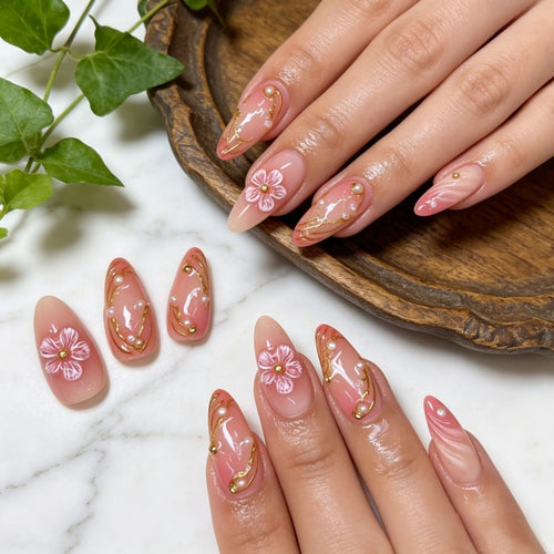 Artificial nails with floral decorations and gold accents Bowlift