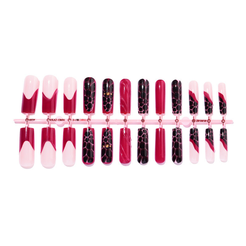 Nail set with stylish marbled designs and delicate accents Bowlift