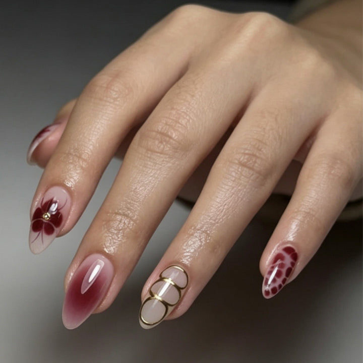 Artificial nails with elaborate flower designs and elegant accents Bowlift