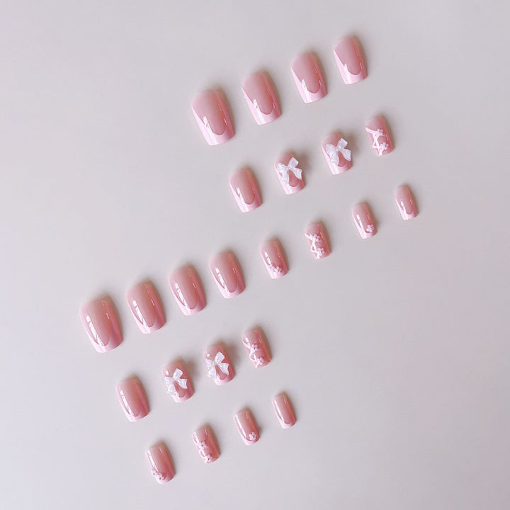 Artificial nail set with filigree 3D flowers and bows Bowlift