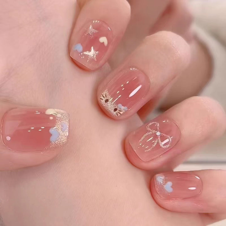 Artificial nails with elegant ombre effect and glitter coating Bowlift