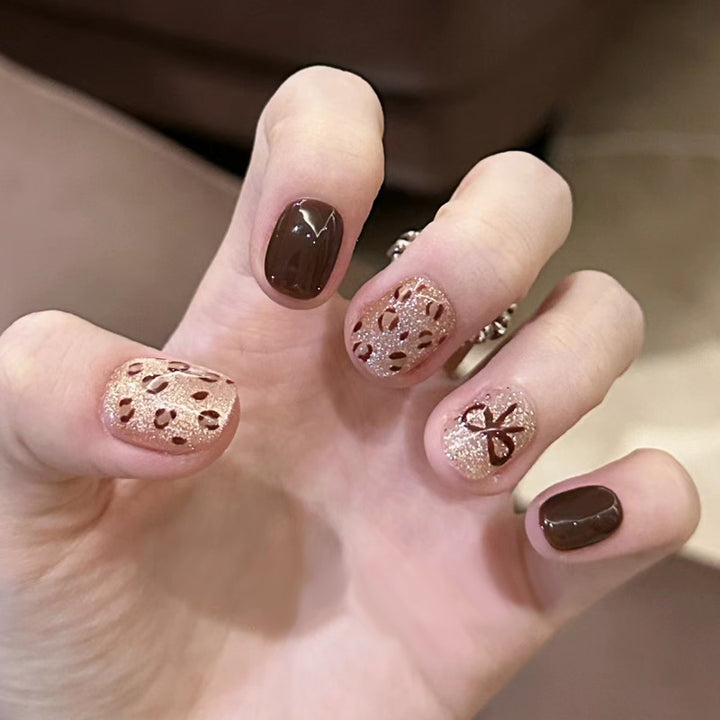Glamorous Press-On Nail Set with Decorative Gemstone Accents Bowlift