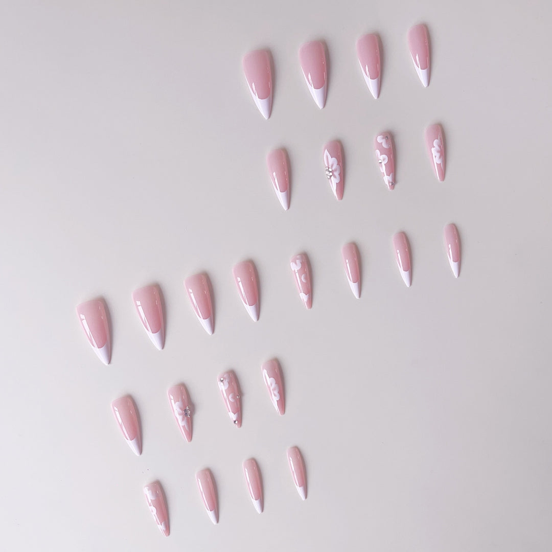 Elegant artificial nail set with floral design and glitter accents Bowlift