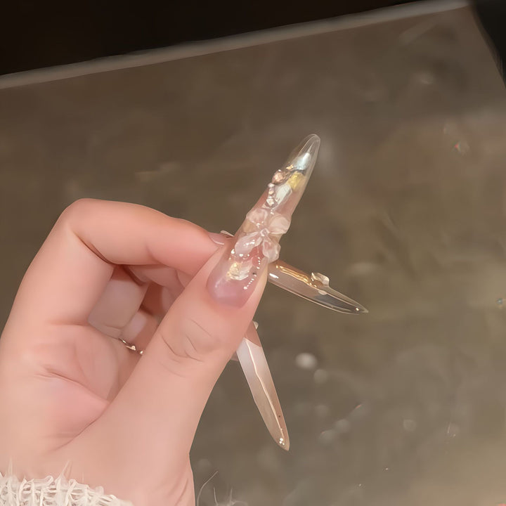 Art nails with filigree floral designs Bowlift