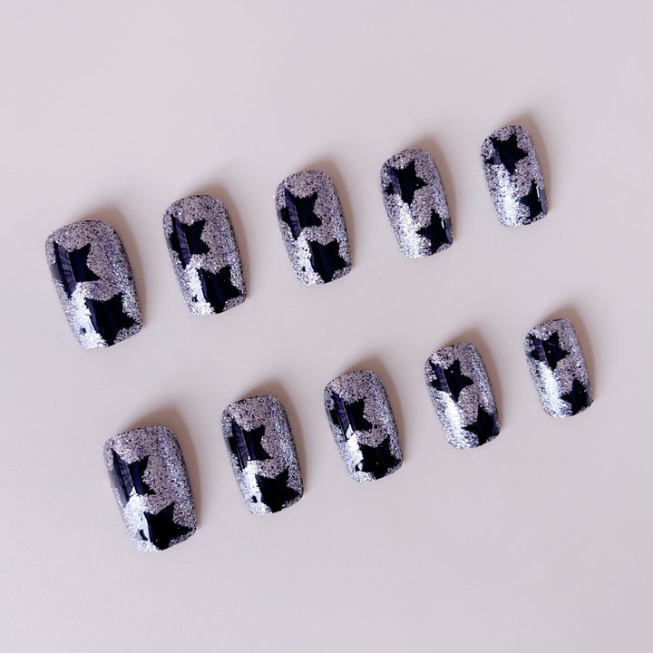 Artificial nail set with glamorous rhinestone embellishments and star motifs Bowlift
