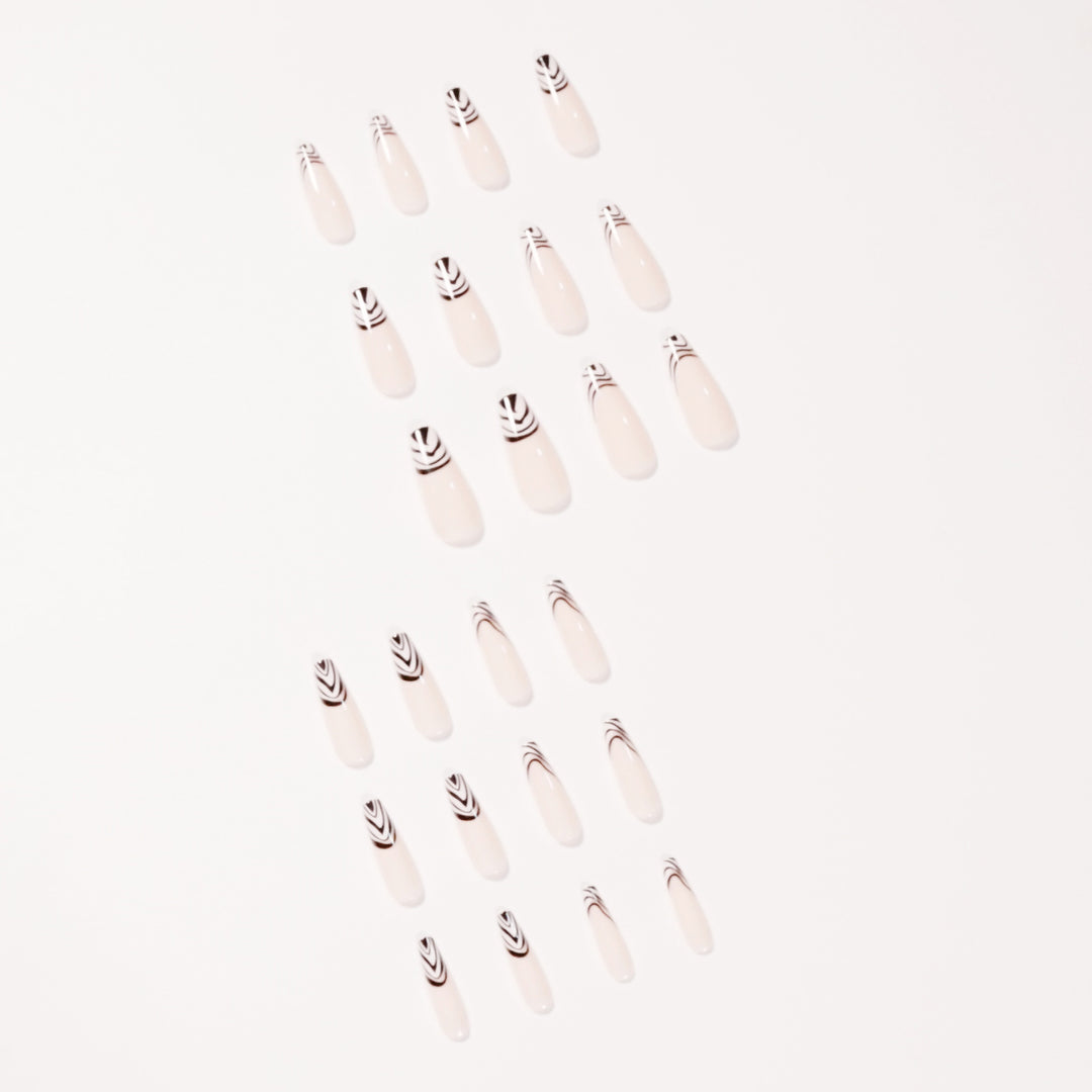 Artful Nail Extensions with Elegant Black-White Pattern Bowlift