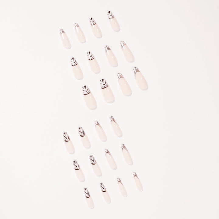 Artful Nail Extensions with Elegant Black-White Pattern Bowlift