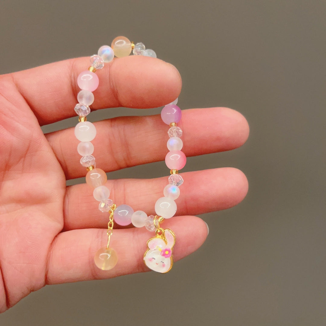 Playful bracelet with colorful glass beads and pendant Bowlift