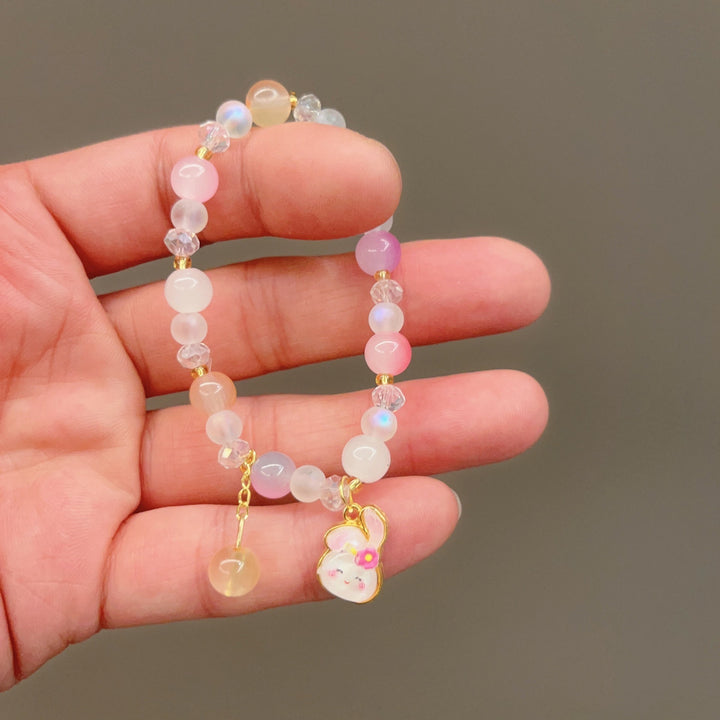 Playful bracelet with colorful glass beads and pendant Bowlift