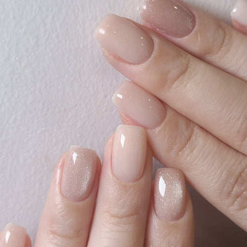 Artificial nail extensions with elegant glitter effect Bowlift