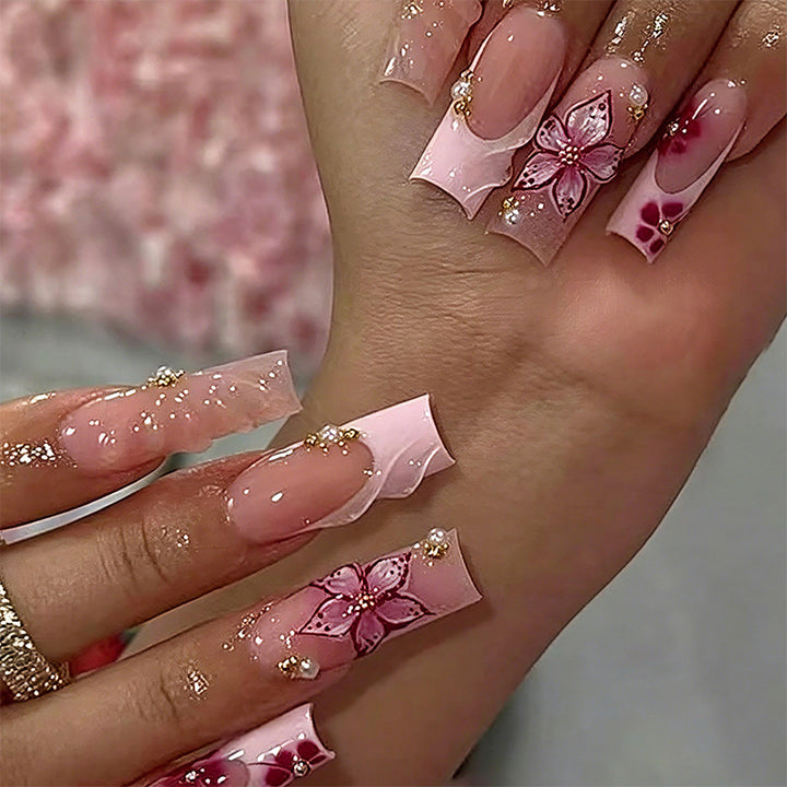 Elegant artificial nails with hand-painted floral accents Bowlift