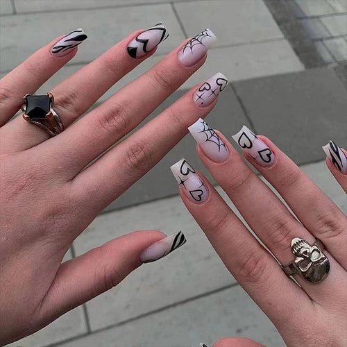 Artificial nails in modern Gothic style Bowlift