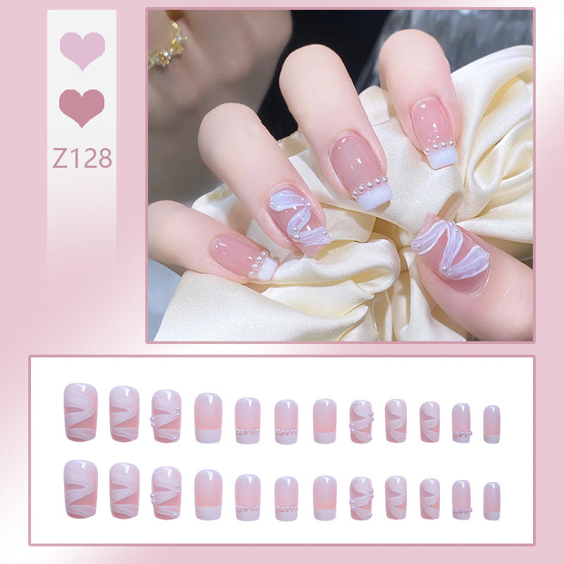 Elegant artificial nail set with stylish wave pattern and pearl accents Bowlift