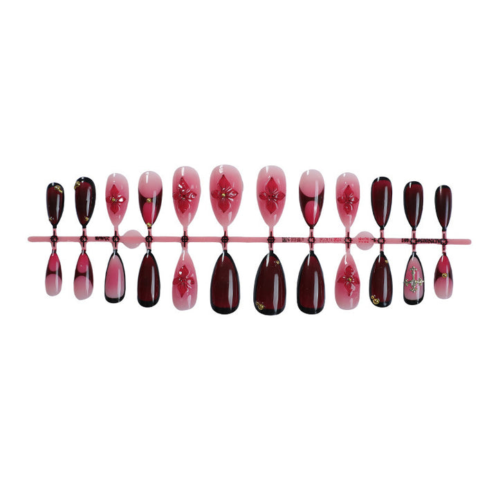 Artificial nail set with elegant flower and glitter decorations Bowlift