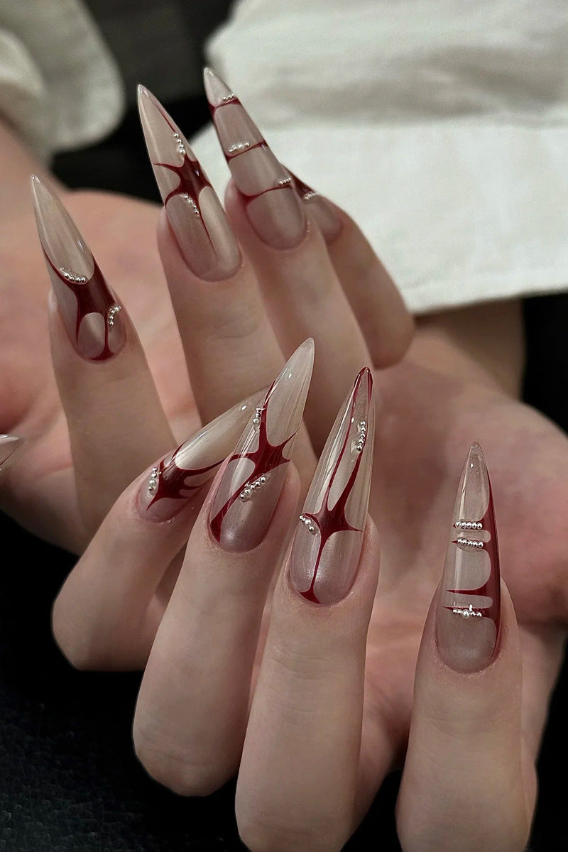 Artistic Stiletto Press-On Nails with Unique Abstract Design Bowlift