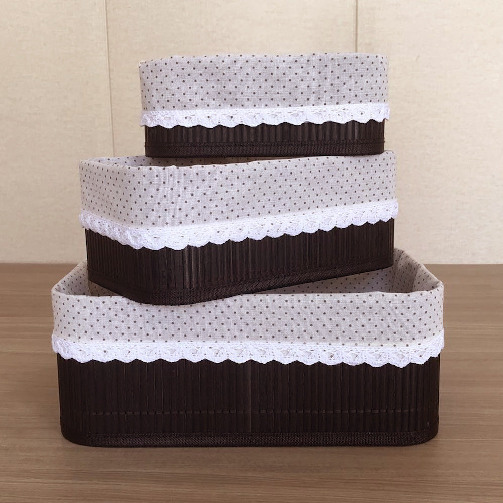 Storage baskets with decorative fabric insert Bowlift