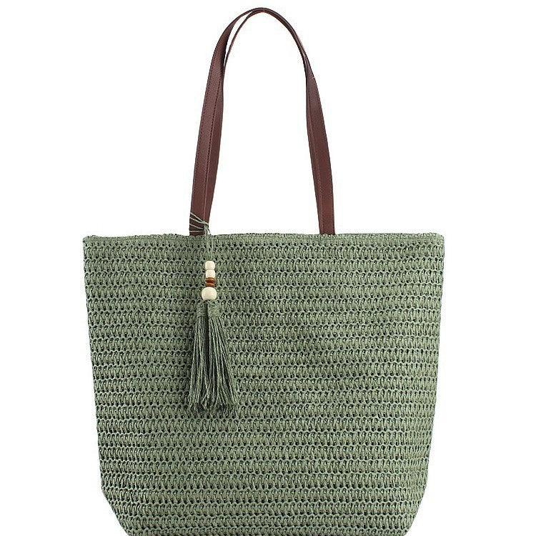Spacious Shoulder Bag Made of Braided Natural Material with Decorative Tassel Bowlift