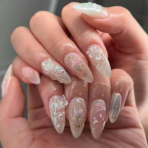 Elegant Stiletto Nail Art Extensions with Floral Embellishments Bowlift