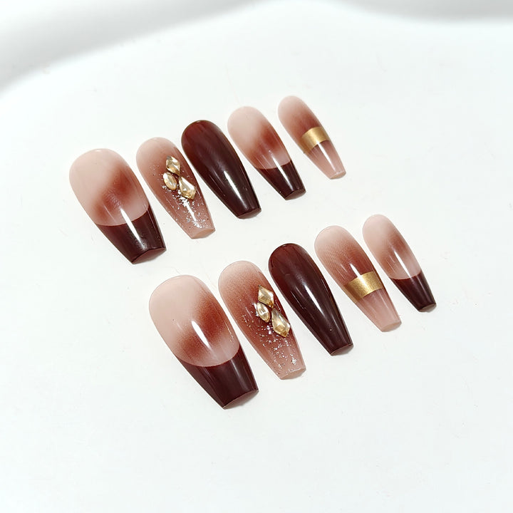 Luxurious artificial nails with glamorous decorations Bowlift