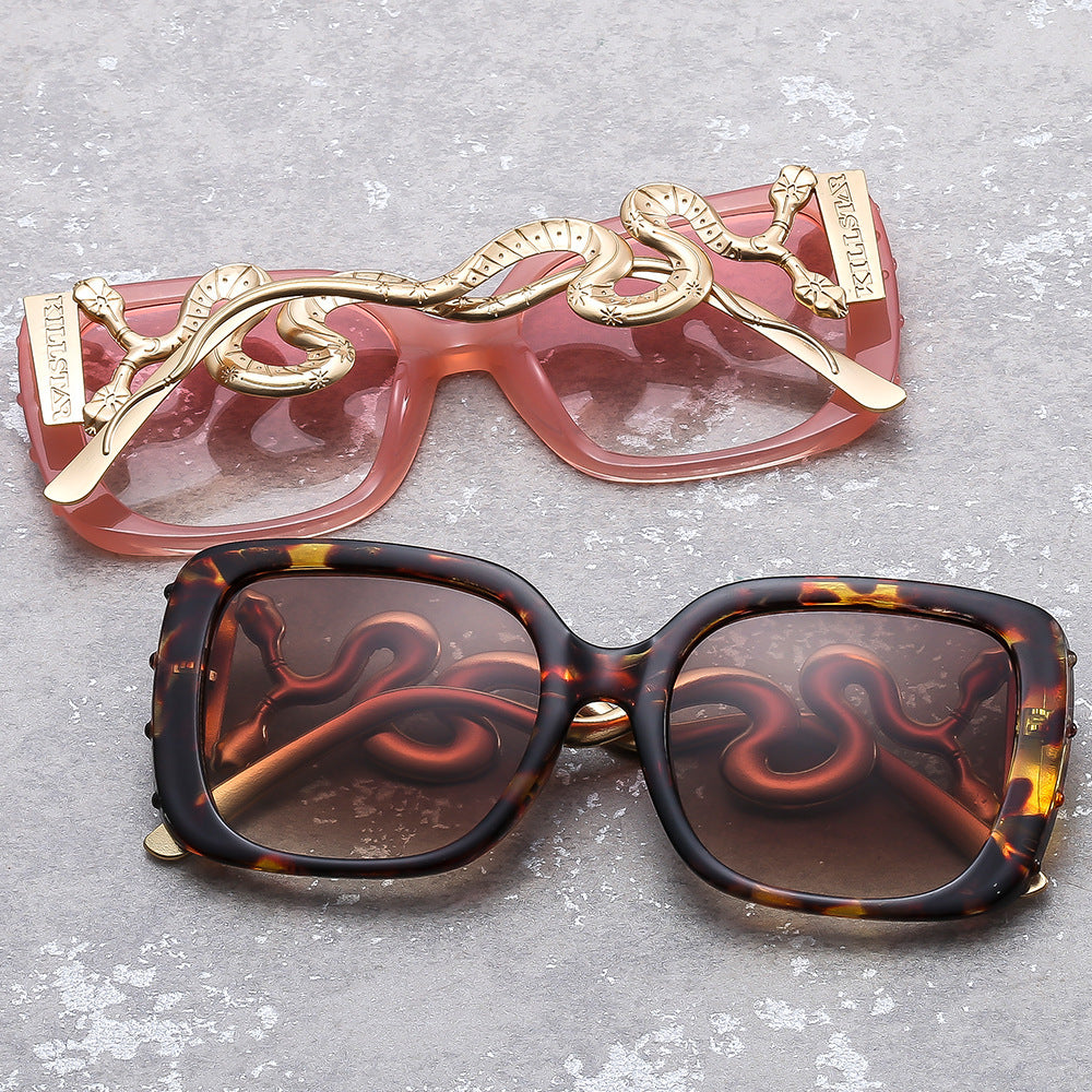 Women's extravagant designer sunglasses with luxurious snake frame Bowlift