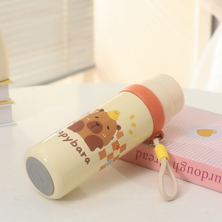 Women's insulated drinking bottle with playful animal design and practical carrying strap Bowlift