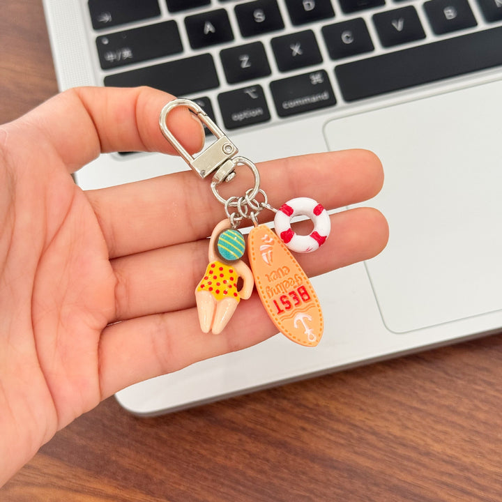 Keychain with Creative Swimming Motif Bowlift