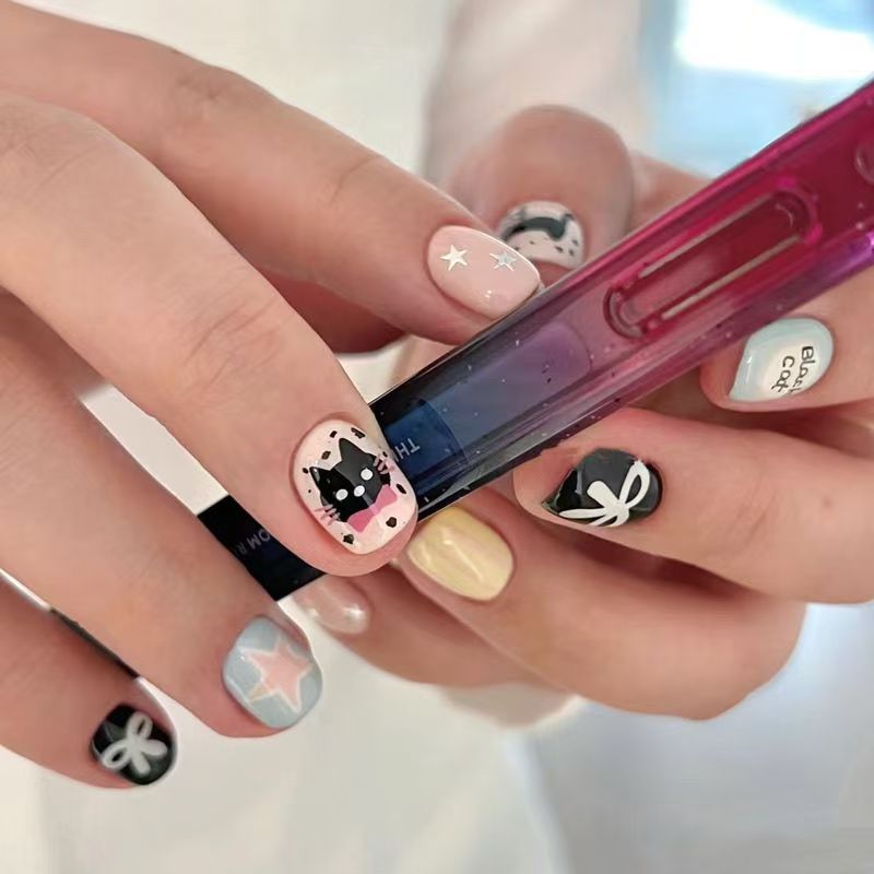 Playful Cat-Themed Press-On Nail Set Bowlift