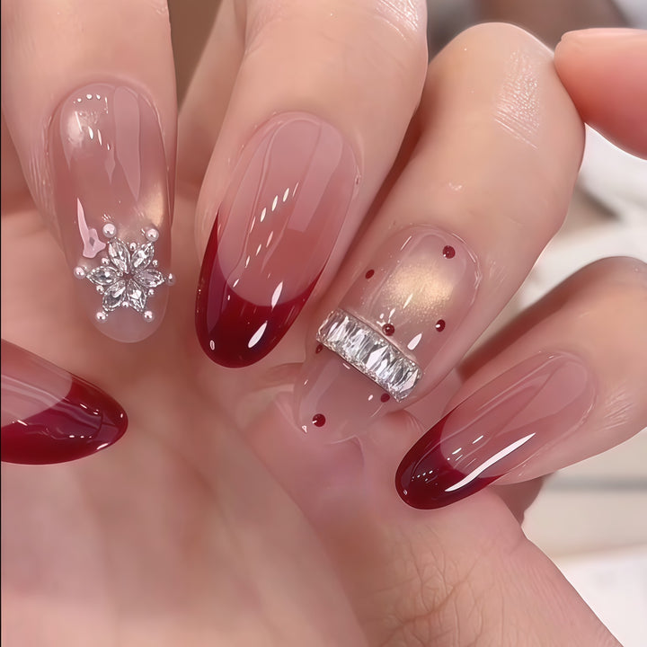 Artificial nails with festive design and rhinestone details Bowlift