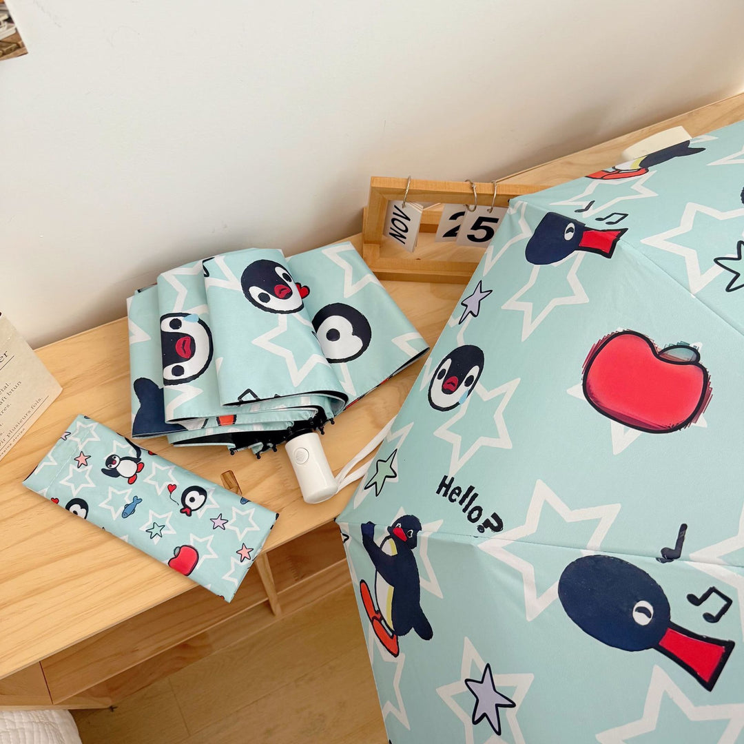 Ladies collapsible umbrella with playful penguin design Bowlift