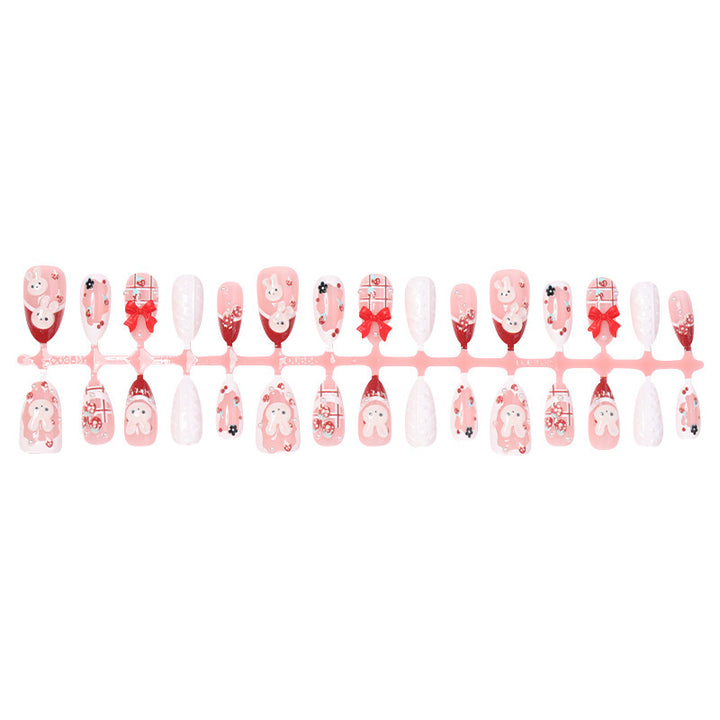 Creative acrylic nail set with playful bunny and gift designs Bowlift