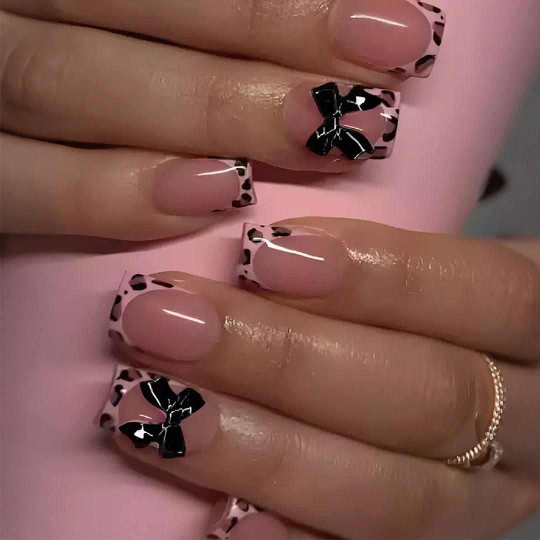 Artificial nail set with delicate bow and leopard patterns Bowlift