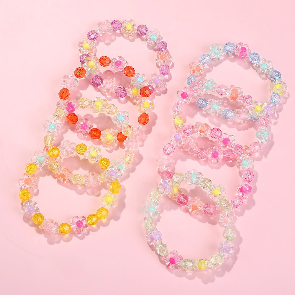 Friendship bracelet with colorful flower motifs Bowlift