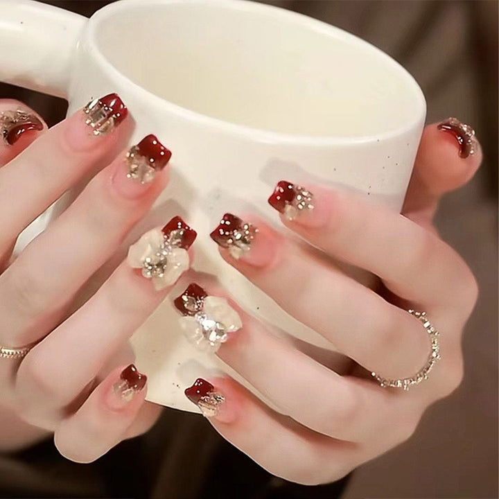 Artificial nails with glamorous floral decorations Bowlift