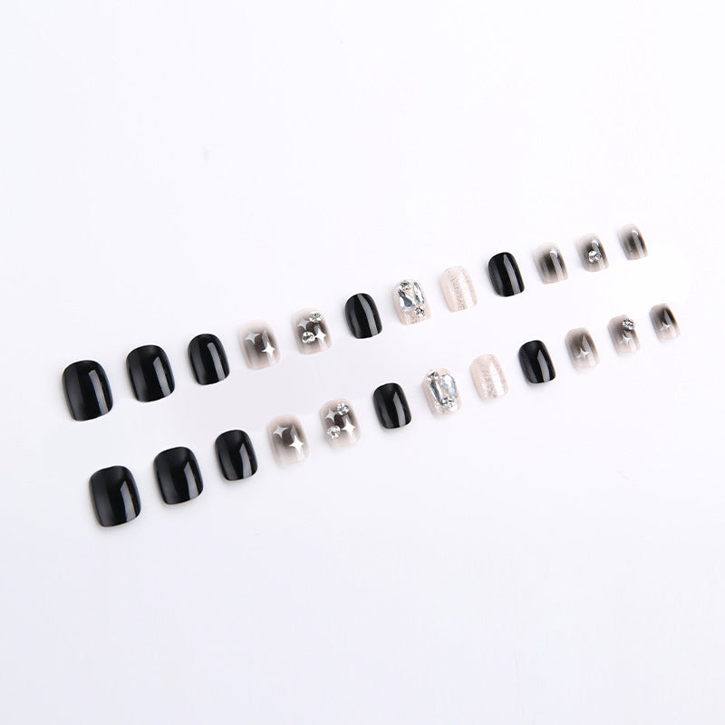 Artificial nail set with glamorous glitter and crystal decorations Bowlift