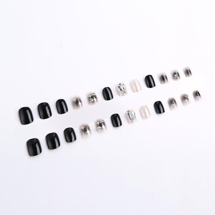 Artificial nail set with glamorous glitter and crystal decorations Bowlift