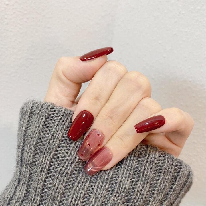 Artificial nail tips with creative dots and high gloss finish Bowlift