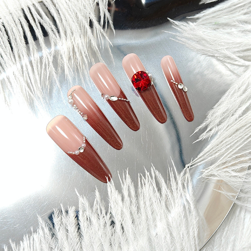 Artificial nails with glamorous rhinestone decorations Bowlift