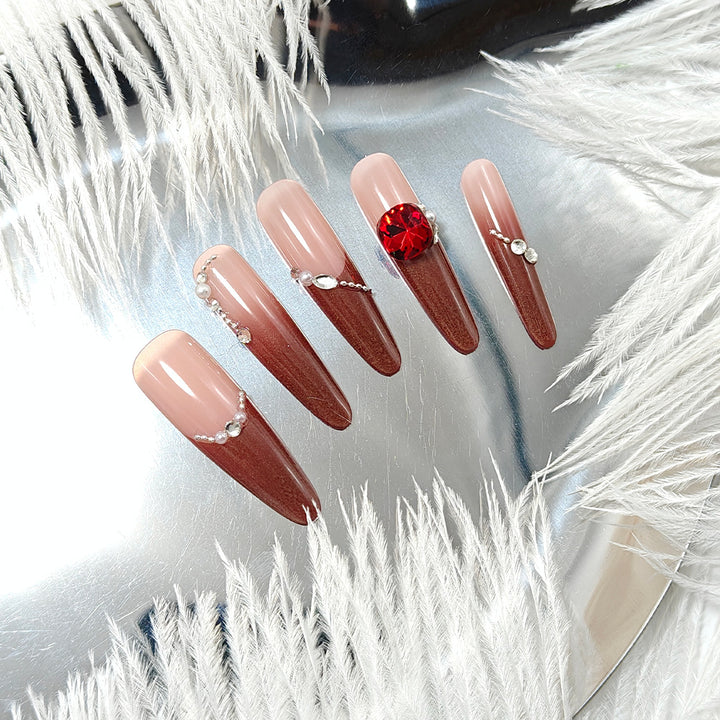 Artificial nails with glamorous rhinestone decorations Bowlift