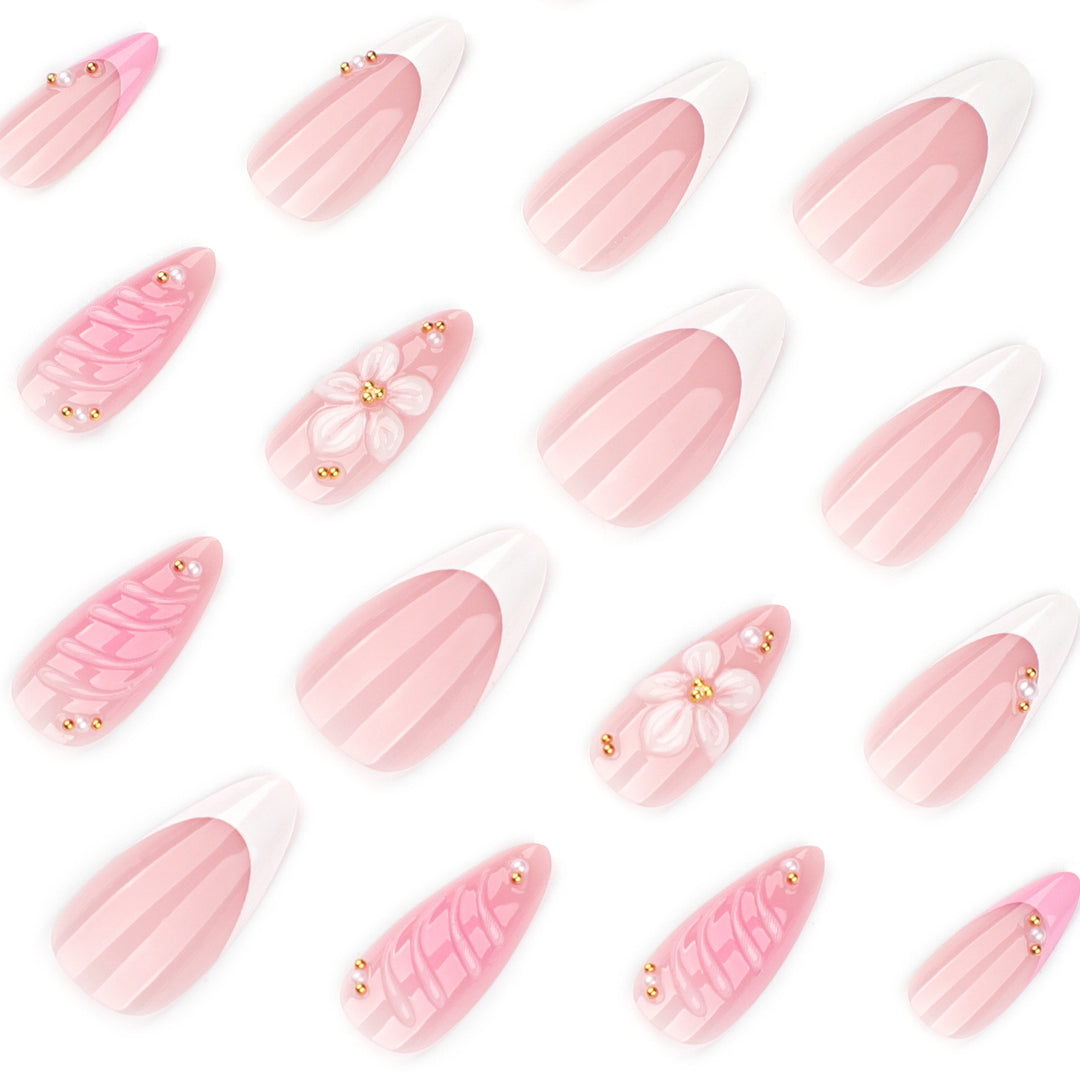 Artificial nail art with floral design and glitter accents Bowlift